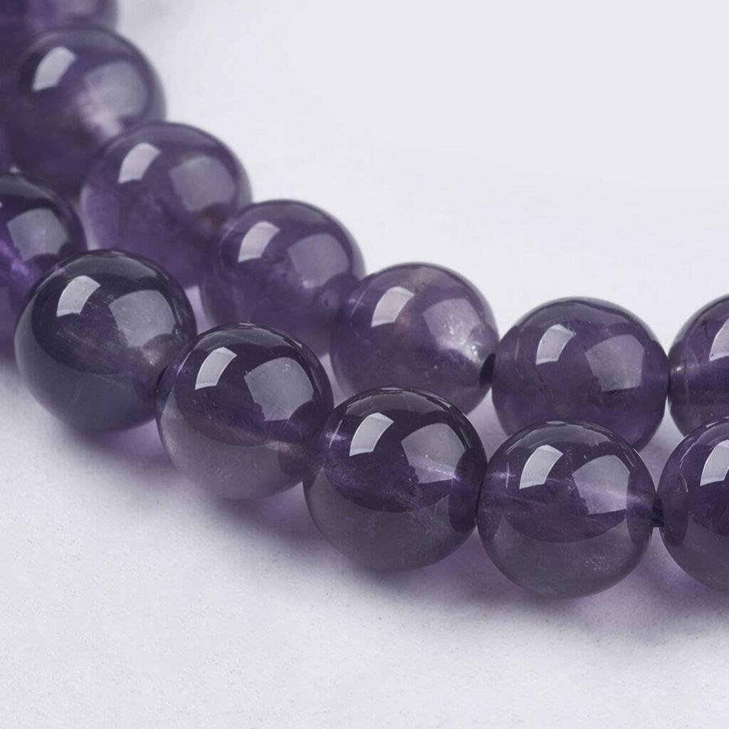 Amethist kralen 6 mm — streng van circa 56 stuks