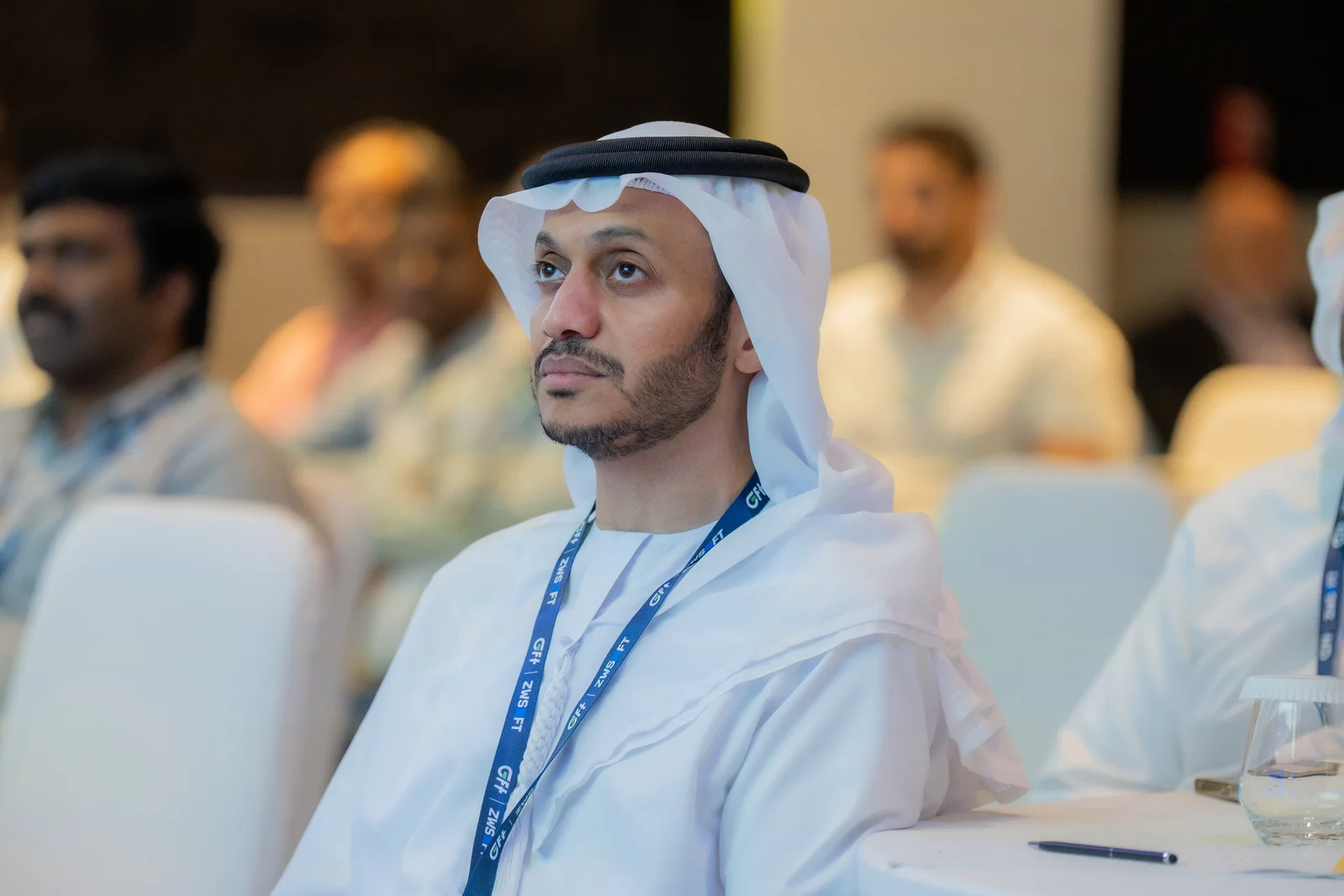 IT leader listening during a session at the GFT CAD Connect Forum in Dubai