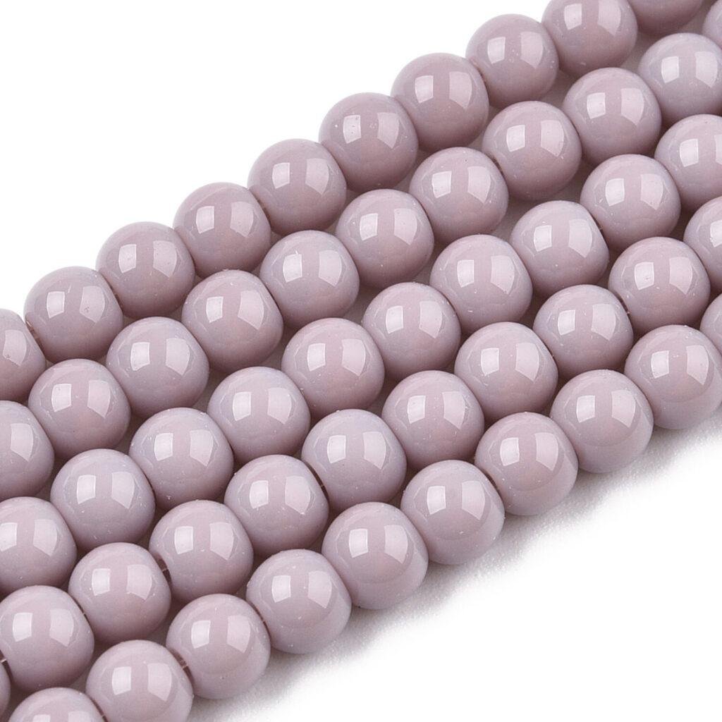 Ronde glaskralen oudroze 4–4,5 mm — circa 90 stuks
