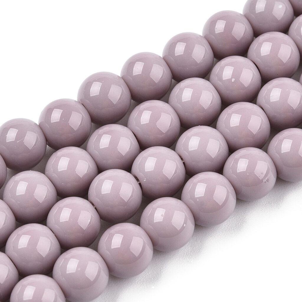 Ronde glaskralen oudroze 6–6,5 mm — circa 62 stuks