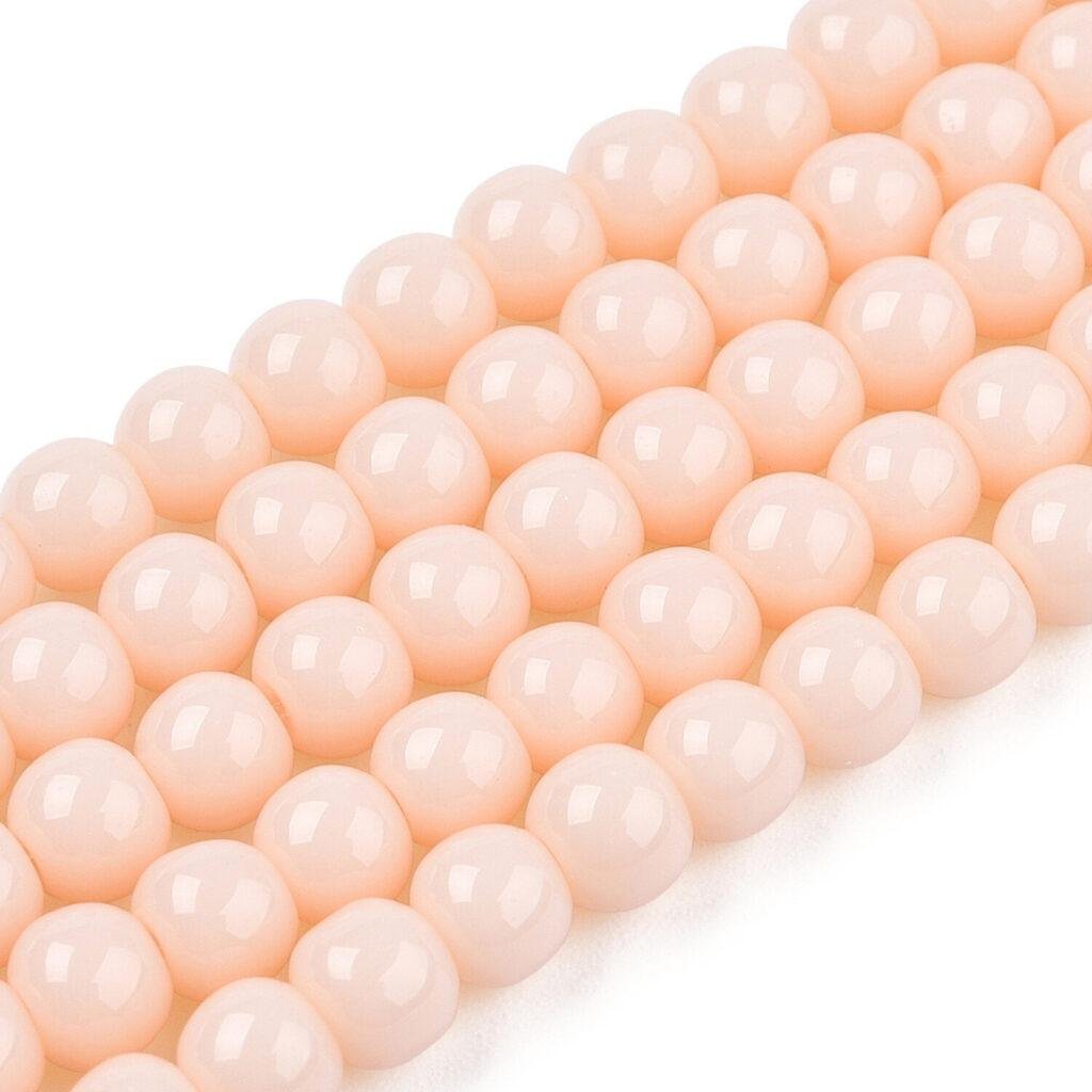 Ronde glaskralen perzikroze 4–4,5 mm — circa 90 stuks
